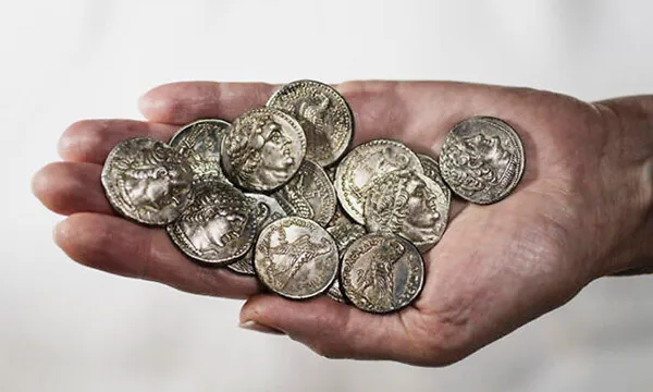 2200-year-old Egyption coins found in the desert in Israel were estimated to be about two months average salary, proving the desperation of the those who left them. (Photo courtesy of Times of Israel)