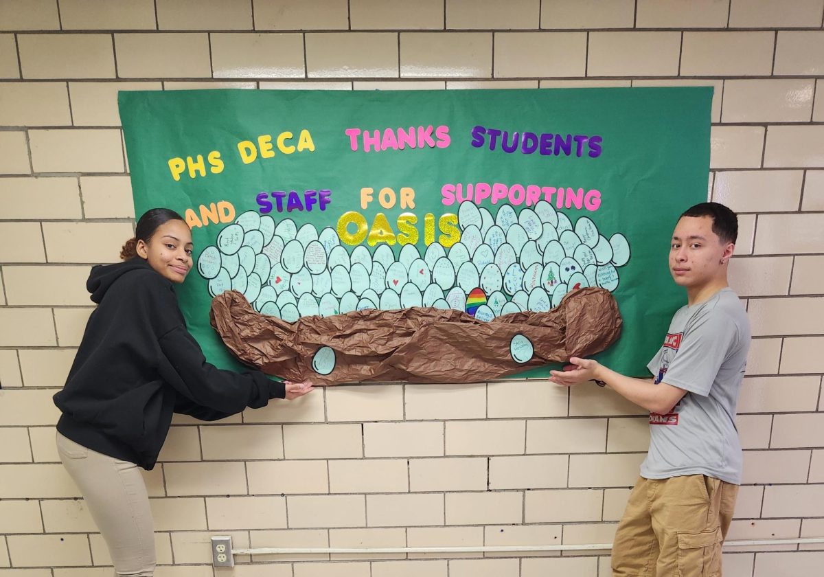 Passaic High School DECA Raises Over $914 for Oasis: A Haven for Women and Children