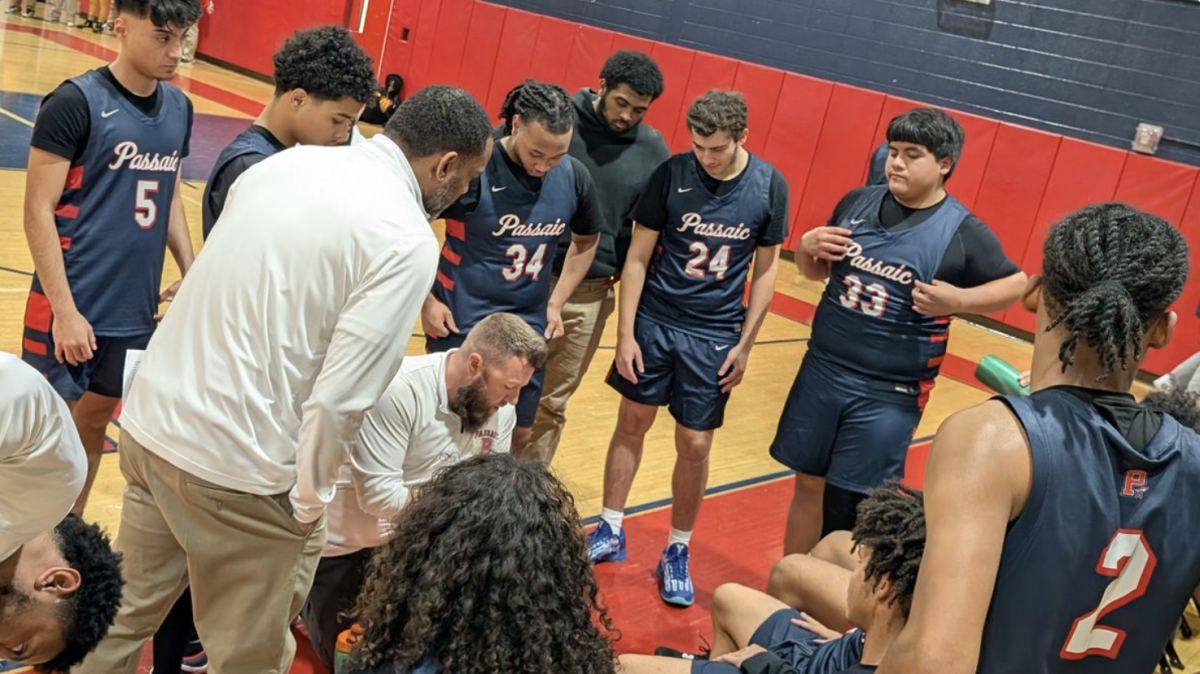 Passaic Boys Varsity Basketball Triumphs in Home Opener with 55-42 Victory