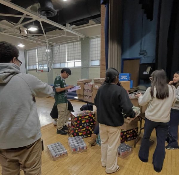 Passaic High School Students Pack Holiday Meals for 150 Local Families